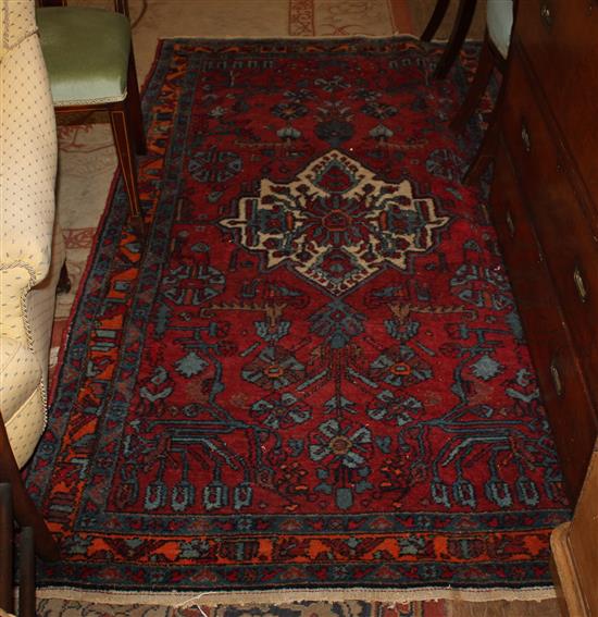 Oriental red ground rug